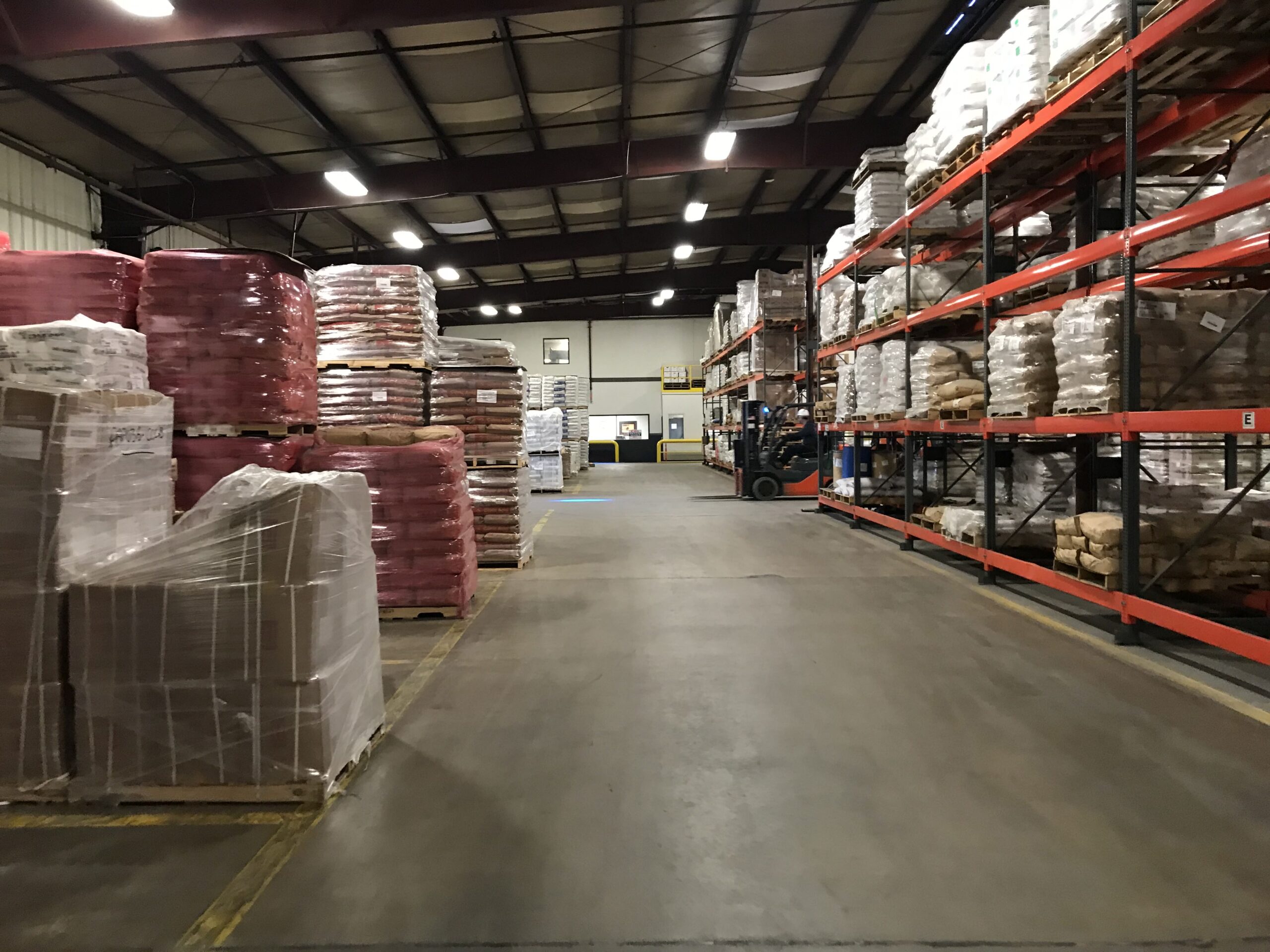 A forklift operator zips around Tilley Distribution's food and ingredient distribution operation at its Baltimore headquarters.