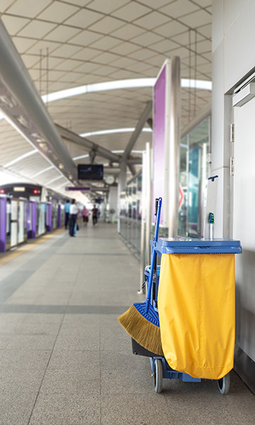 Janitor's cart in an airport lobby.