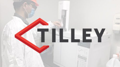 Man in lab with Tilley Distribution logo