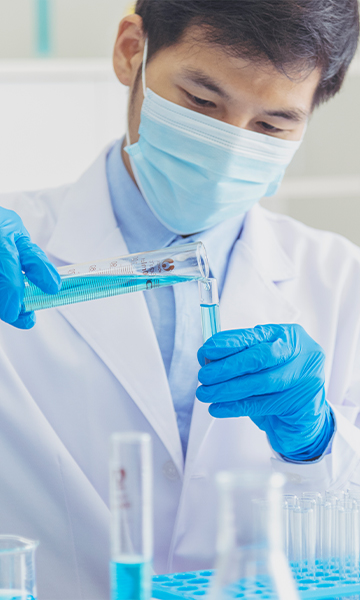 A lab technician analyzes a new compound.