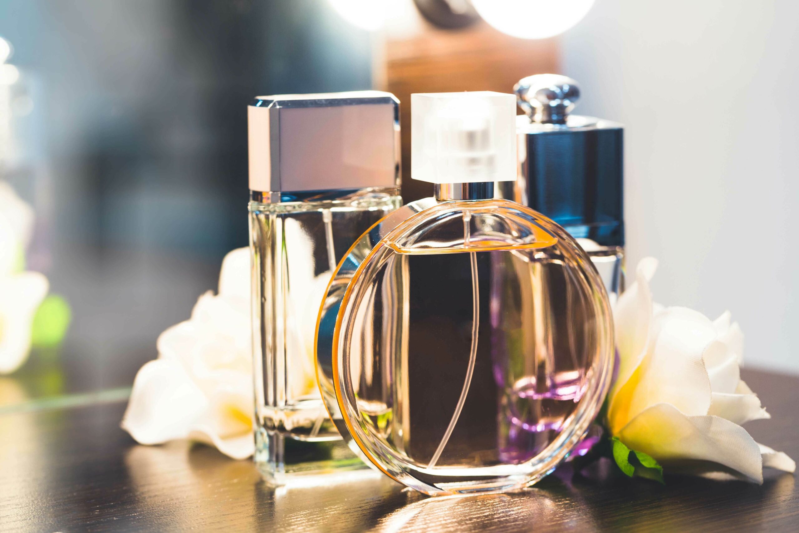 A series of perfume bottles sitting on a table